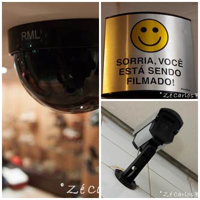 Câmera de segurança instaladas em comércios e residencias, geralmente um aviso de gravação informa os clientes. Foto Flickr @Ze Carlos Barretta Câmera de segurança instaladas em comércios e residencias, geralmente um aviso de gravação informa os clientes